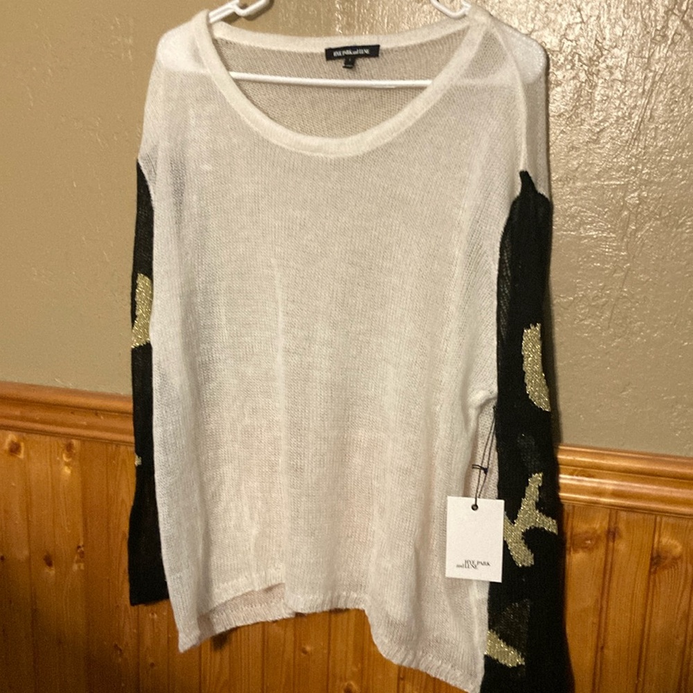 Black and White Crew Neck Sweater with Polka Dot Sleeves